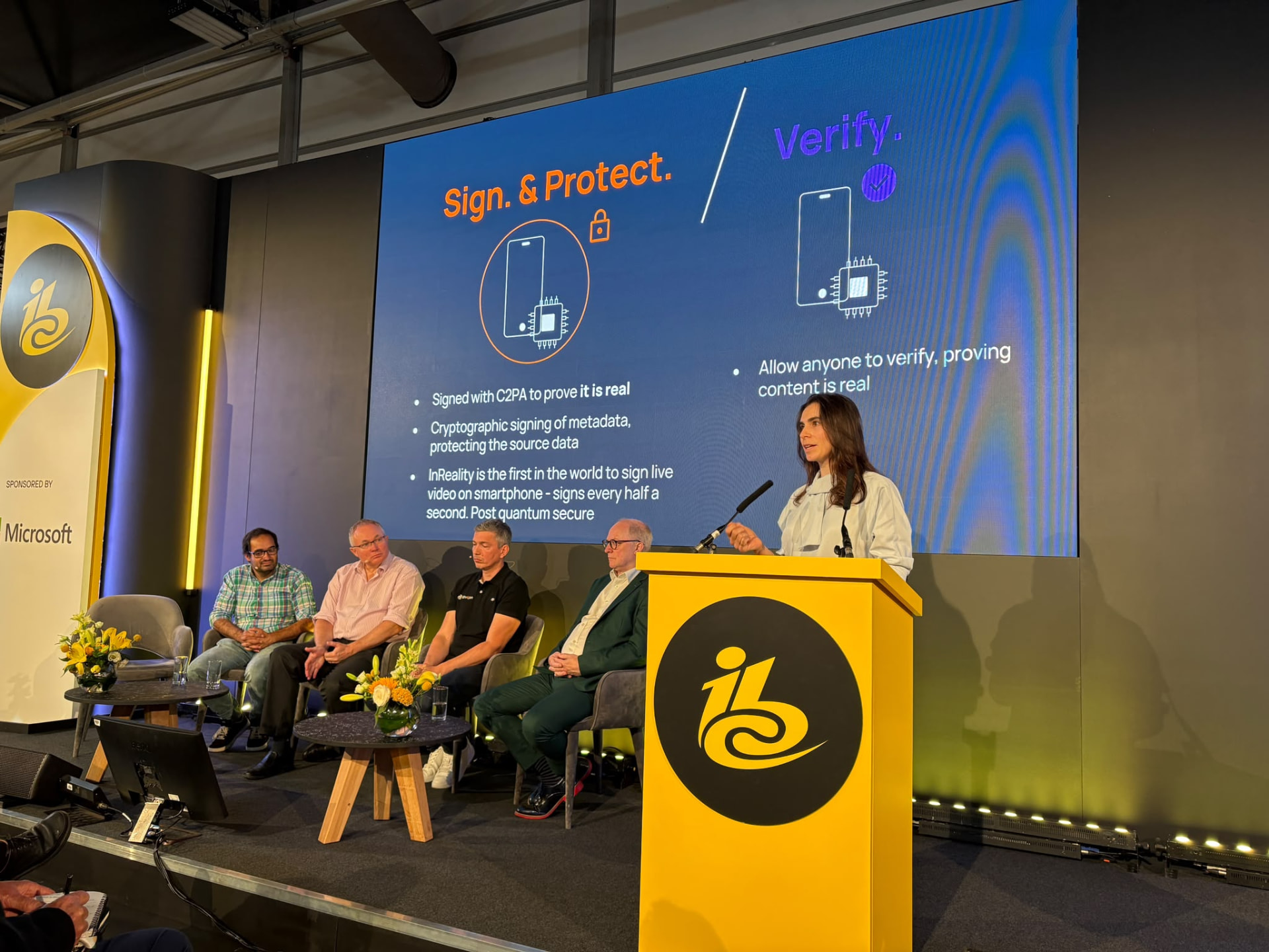 Alicia Scott speaking on a panel about signing and verifying real content at IBC