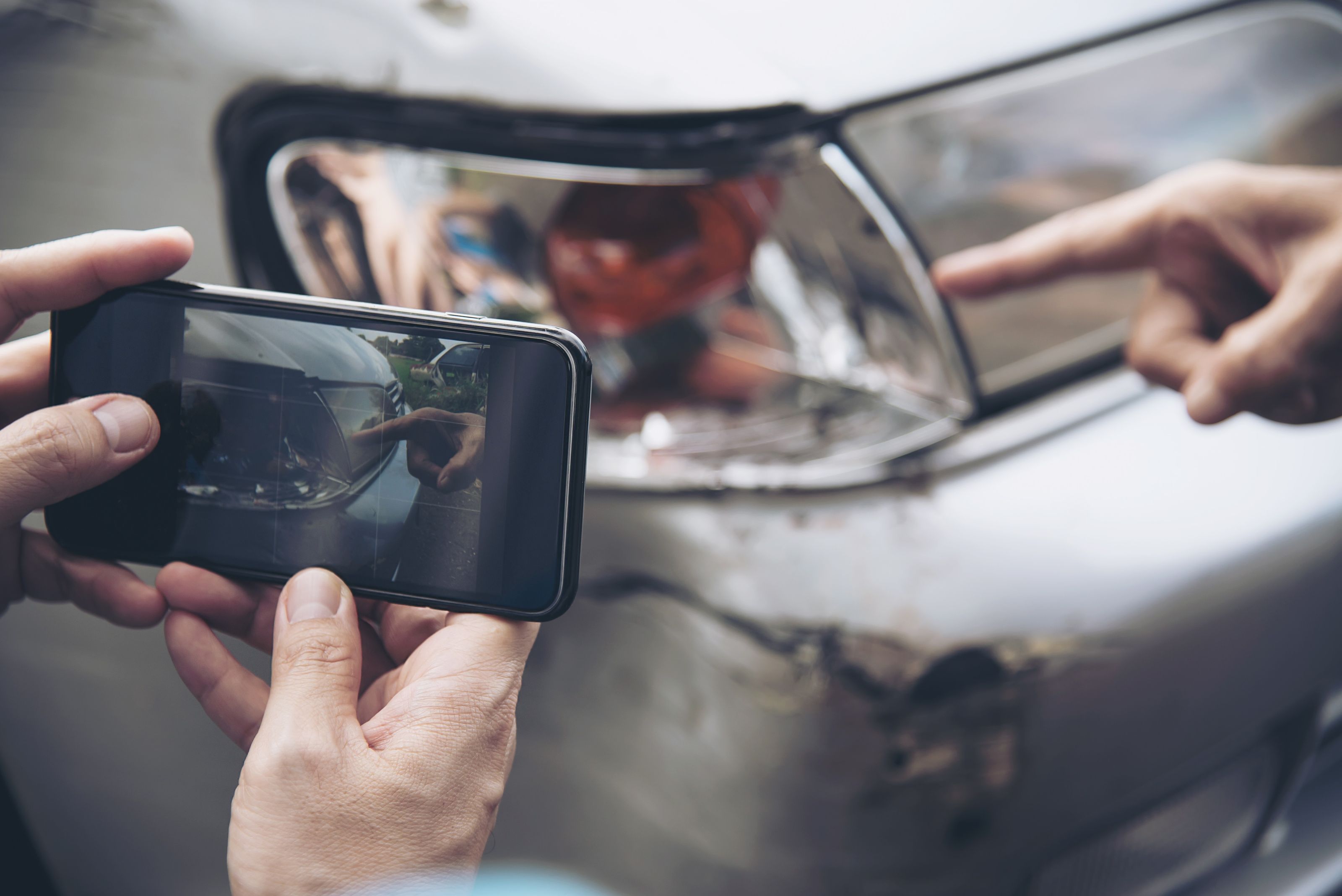 A customer documents car damage